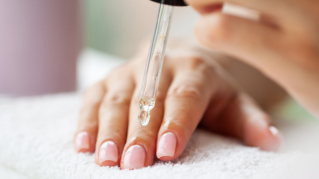 apply cuticle oil for long lasting vacation nails