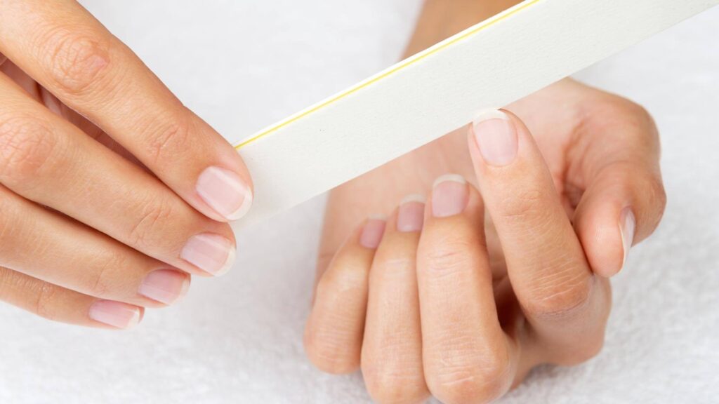 steps in a manicure, filing nails